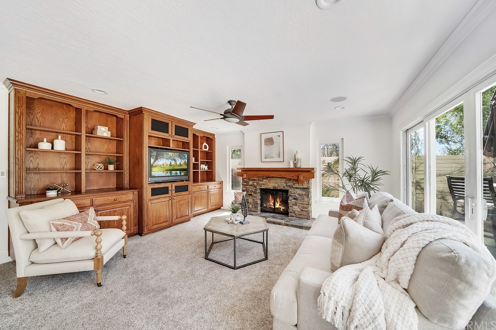 1902 Derby Drive North Tustin, CA 92705 - Photo 23 of 67 a living room with furniture and a fireplace