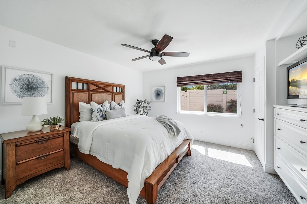 1902 Derby Drive North Tustin, CA 92705 - Photo 25 of 67 a bedroom with a bed and a flat screen tv