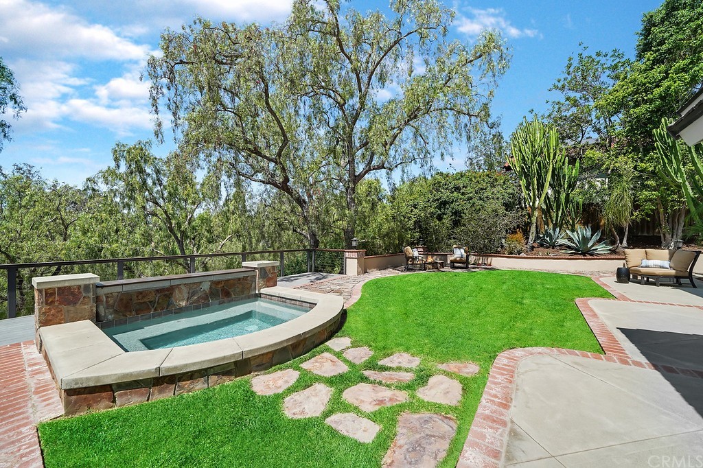 1902 Derby Drive North Tustin, CA 92705 - Photo 48 of 67 a view of backyard with swimming pool and outdoor seating