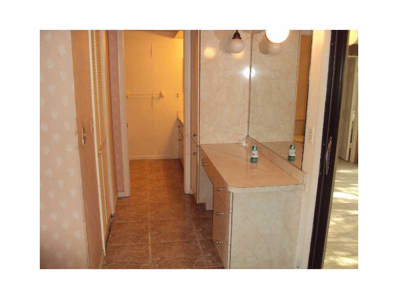 1758 Mistletoe Street Sebastian, FL 32958 - Photo 8 of 13 a bathroom with sink and mirror