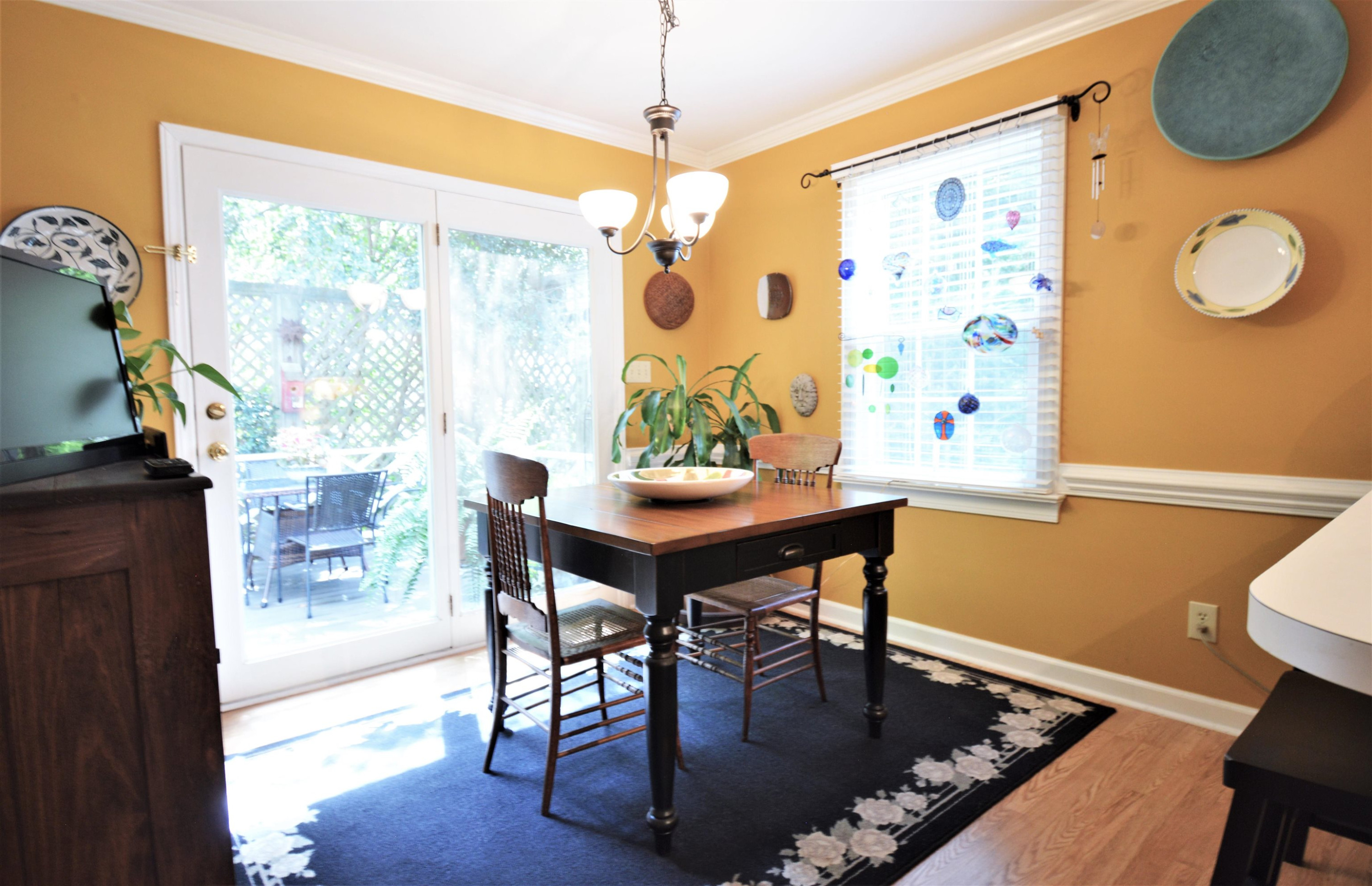 7008 Sandringham Drive Raleigh, NC 27613 - Photo 11 of 52 This captivating breakfast room would start anyone's day off on a good note! The breakfast room has laminate floors, crown and chair rail molding. Breakfast Room