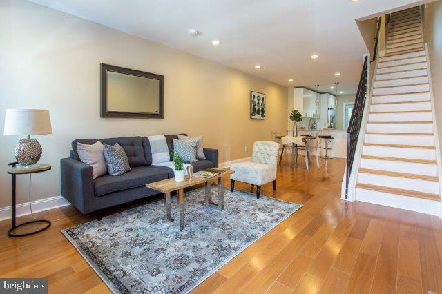 2026 McClellan Street Philadelphia, PA 19145 - Photo 1 of 32 a living room with furniture and a rug