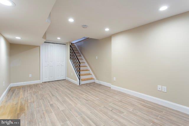 2026 McClellan Street Philadelphia, PA 19145 - Photo 16 of 32 an empty room with wooden floor and entryway