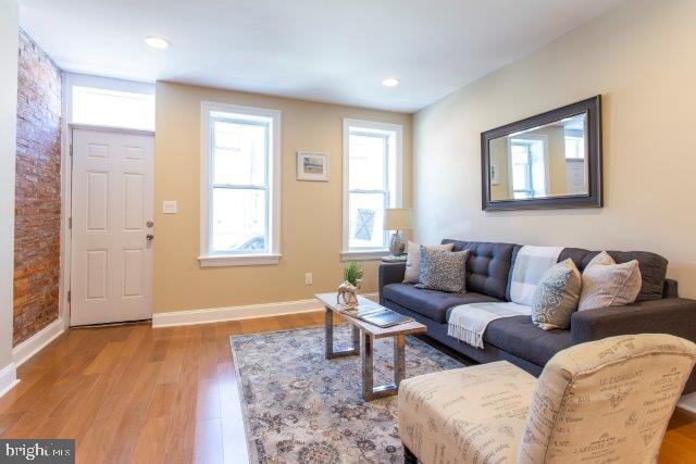 2026 McClellan Street Philadelphia, PA 19145 - Photo 2 of 32 a living room with furniture and a window