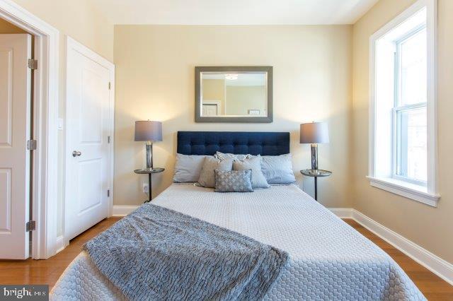 2026 McClellan Street Philadelphia, PA 19145 - Photo 23 of 32 a bedroom with a bed and a window