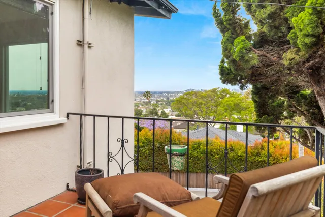 a view of a balcony with an outdoor space