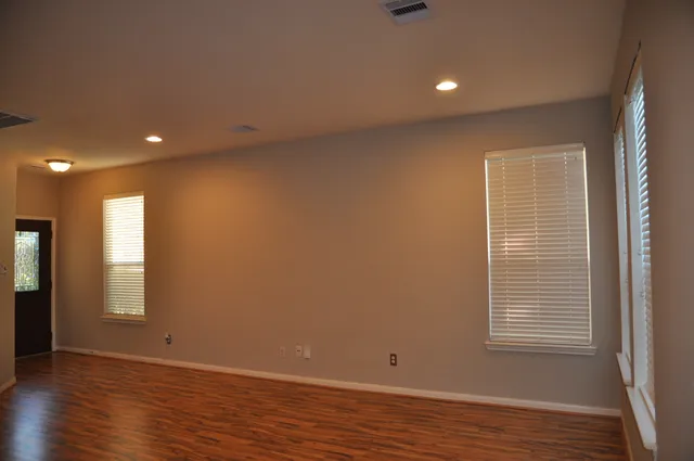 a stove top oven sitting inside of a kitchen