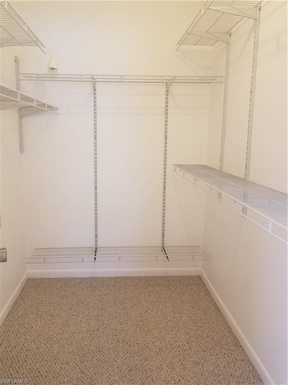 4363 27th Court Southwest, Unit 2103 Naples, FL 34116 - Photo 12 of 15 a view of an empty room