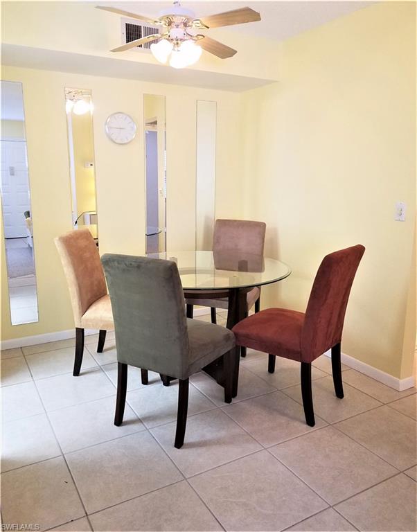 4363 27th Court Southwest, Unit 2103 Naples, FL 34116 - Photo 4 of 15 a view of a livingroom with furniture