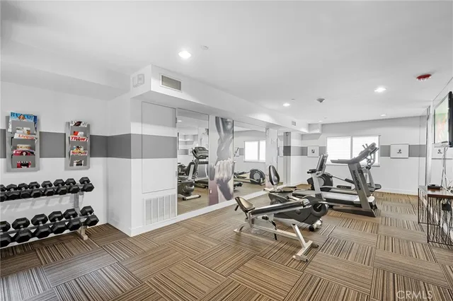 a view of a room with gym equipment