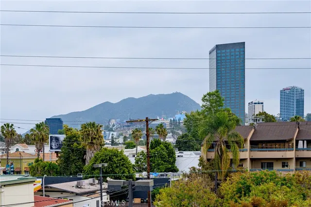 a view of a city with tall buildings