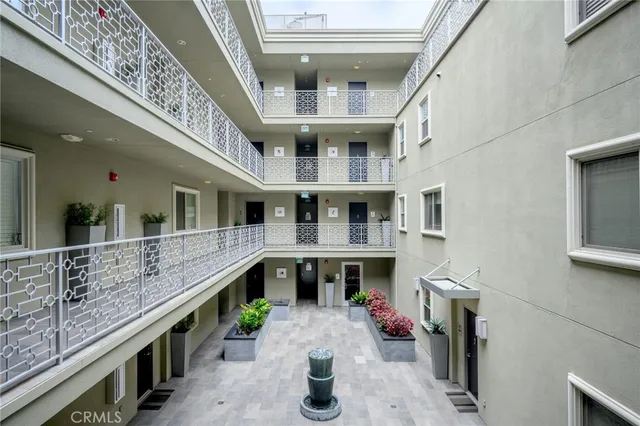 a view of living room kitchen and kitchen