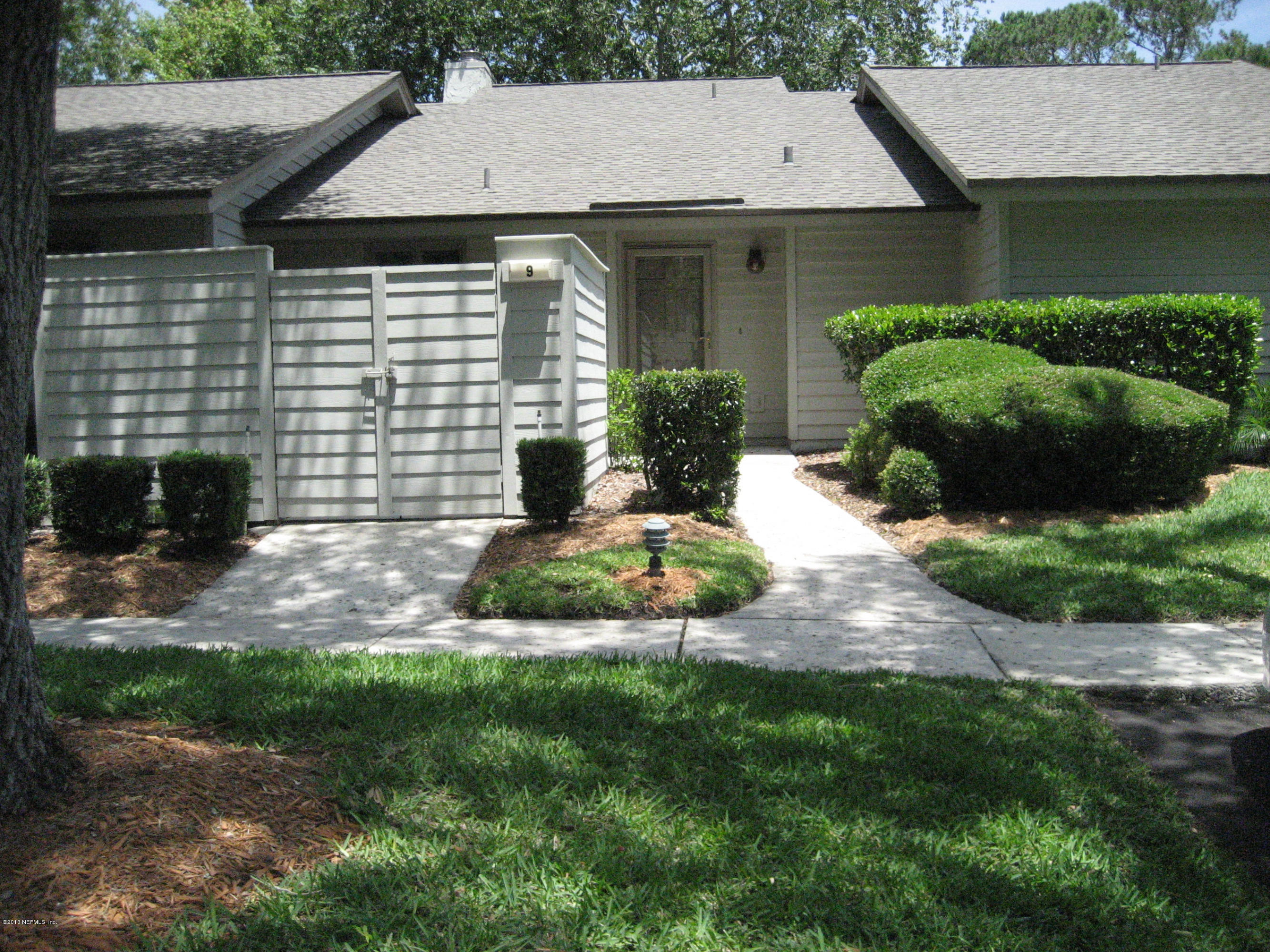 9 Players Club Villas Road Ponte Vedra Beach, FL 32082 - Photo 1 of 21 a view of a back yard of the house
