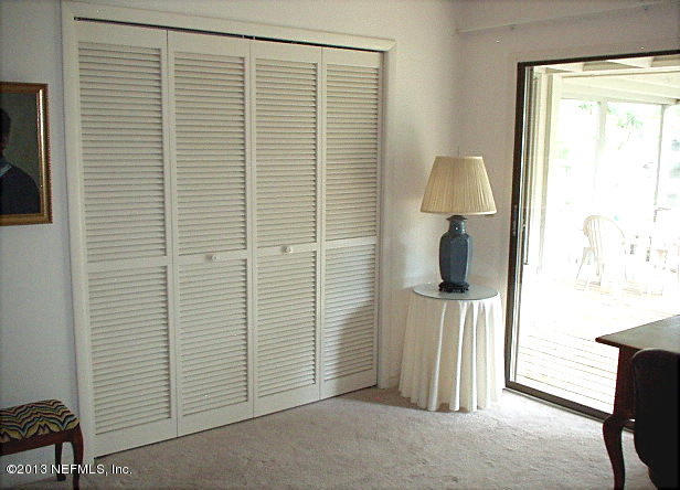 9 Players Club Villas Road Ponte Vedra Beach, FL 32082 - Photo 19 of 21 a view of a room with a table and a chair