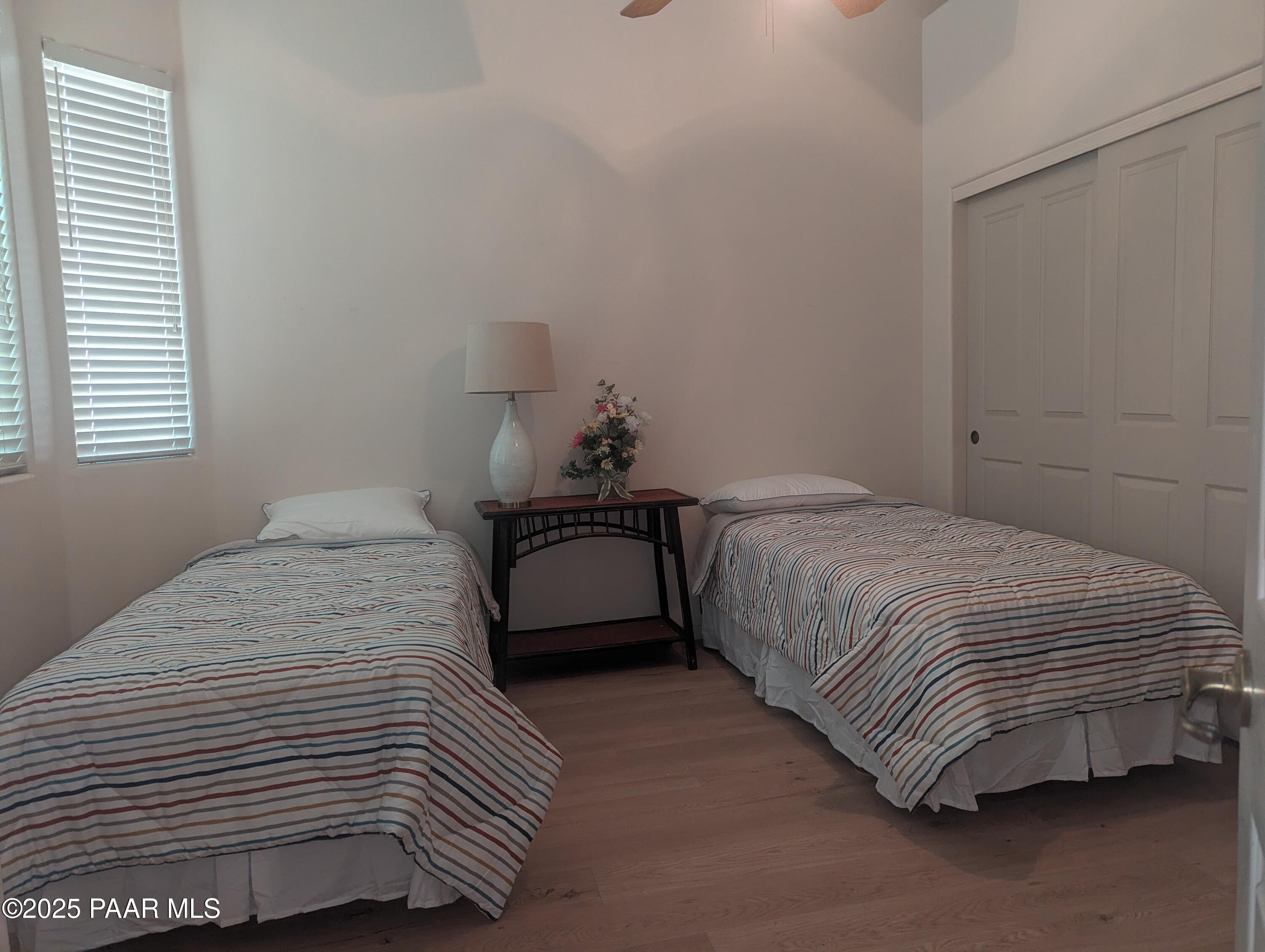 2365 Sequoia Drive Prescott, AZ 86301 - Photo 12 of 17 a bedroom with a bed and a window