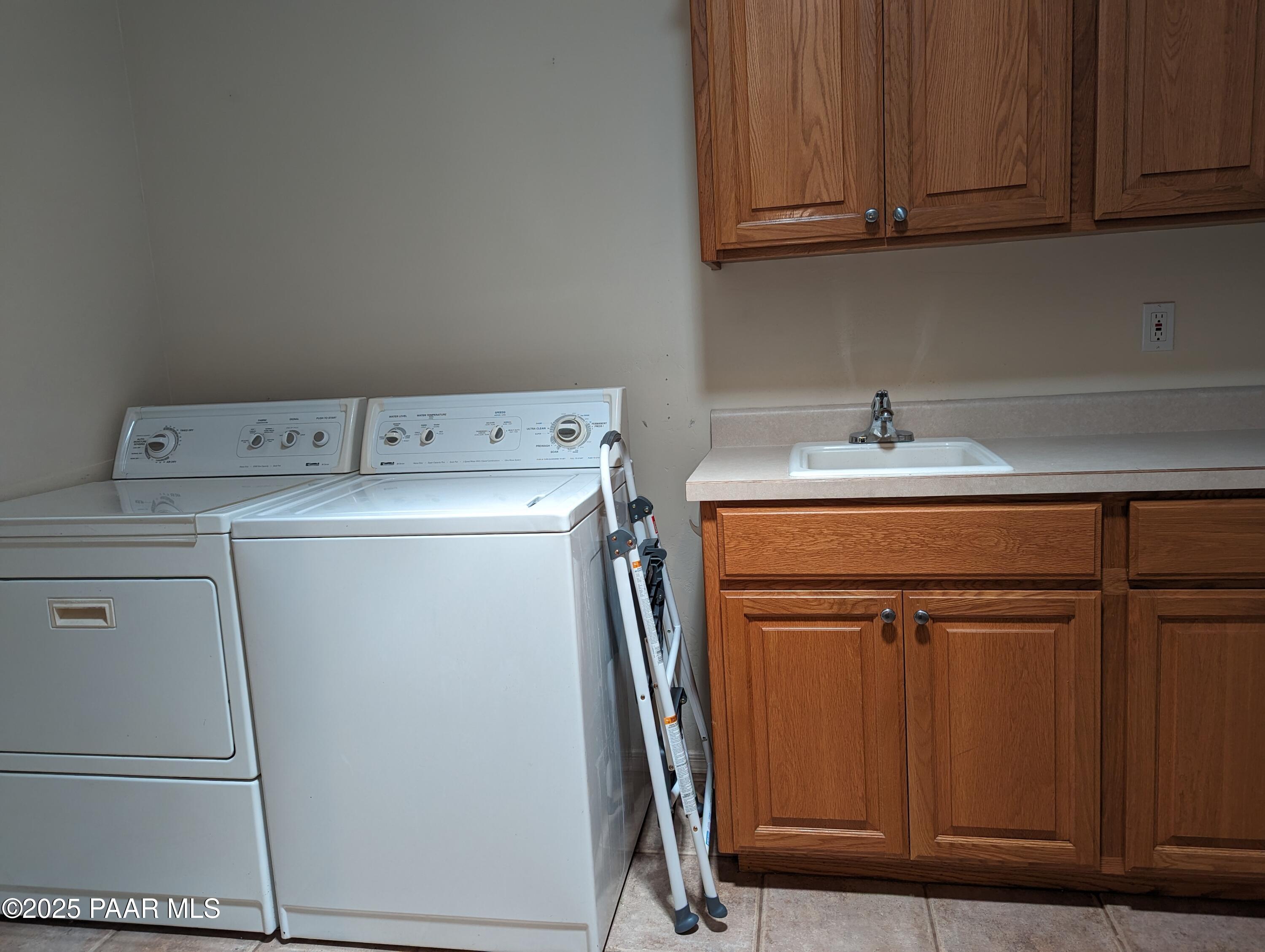 2365 Sequoia Drive Prescott, AZ 86301 - Photo 17 of 17 a utility room with dryer and washer