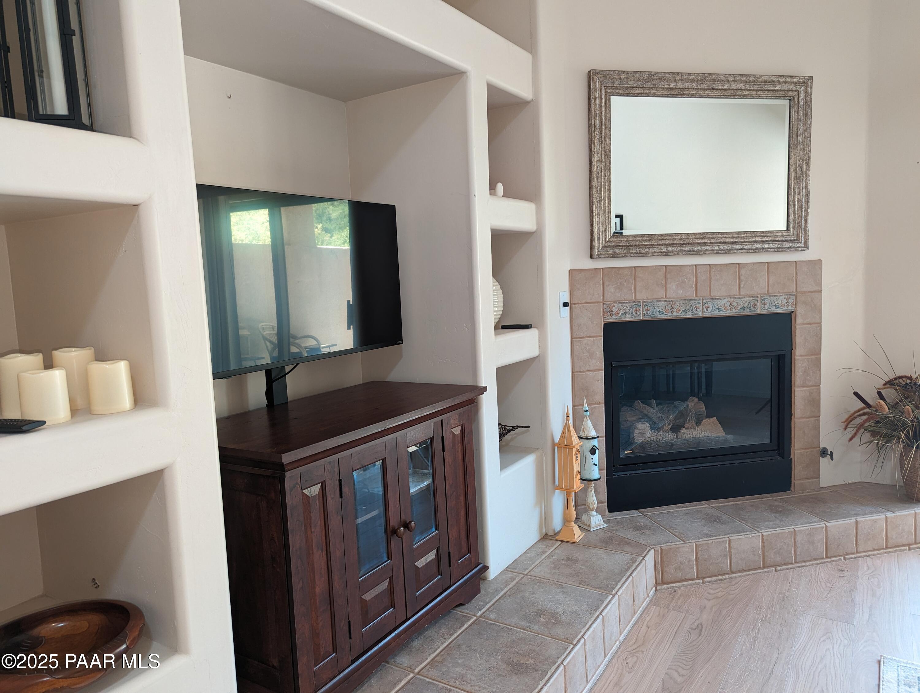 2365 Sequoia Drive Prescott, AZ 86301 - Photo 2 of 17 a living room with furniture and a fireplace