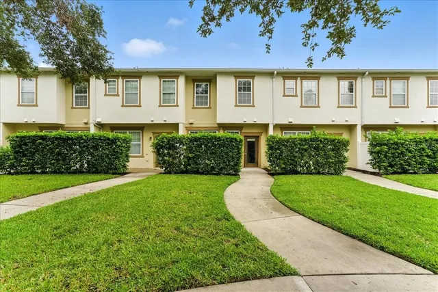 a view of a park with swings and slides