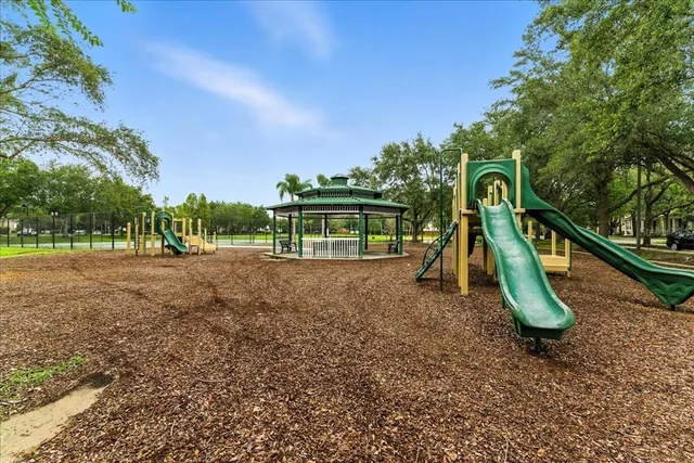 a lake view with a big yard