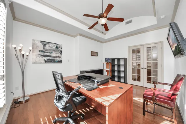 a workspace with furniture and window