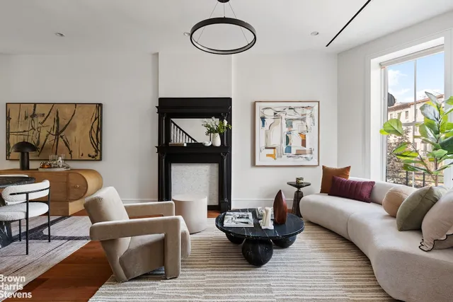 a black and white photo of a living room