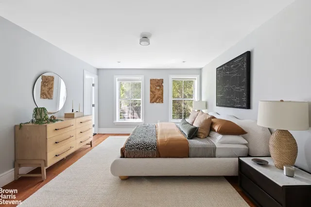 a view of a backyard with sitting area