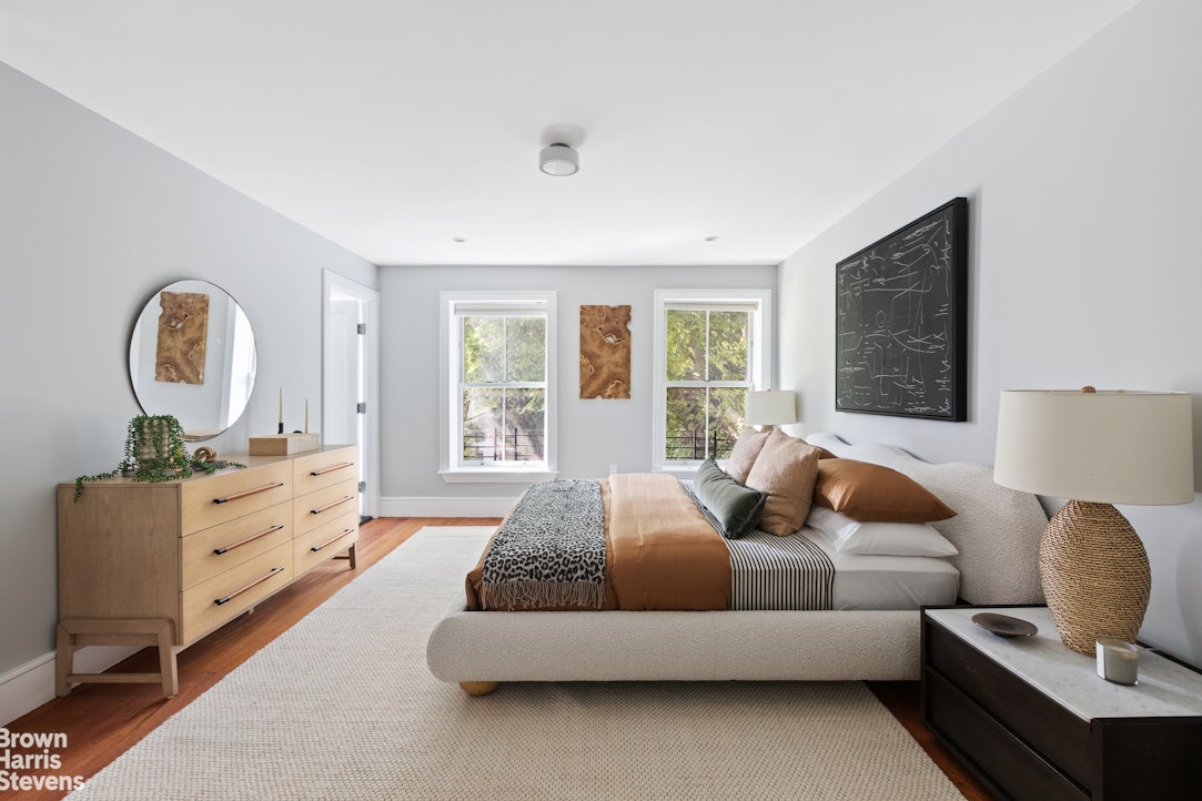 210 Macon Street Brooklyn, NY 11216 - Photo 7 of 13 a living room with furniture
