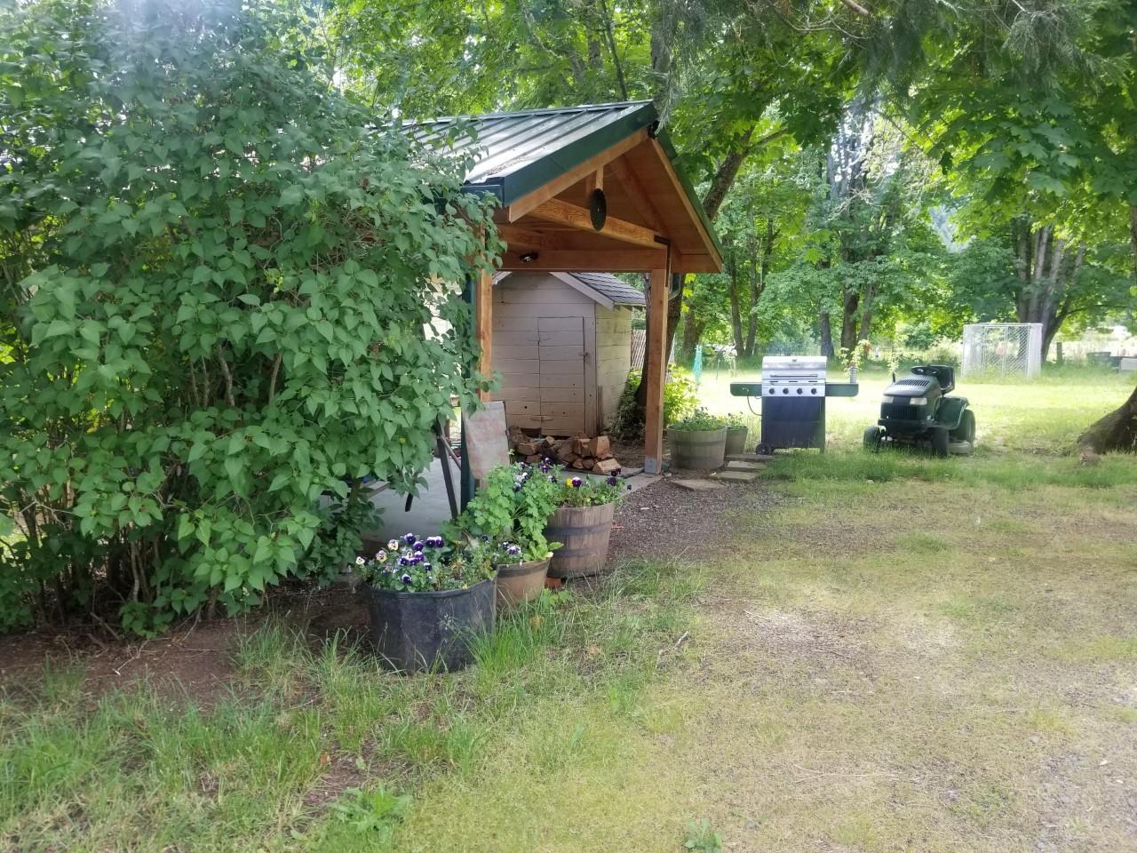 5447 Azalea-Glen Road Glendale, OR 97442 - Photo 3 of 49 Back patio-yard