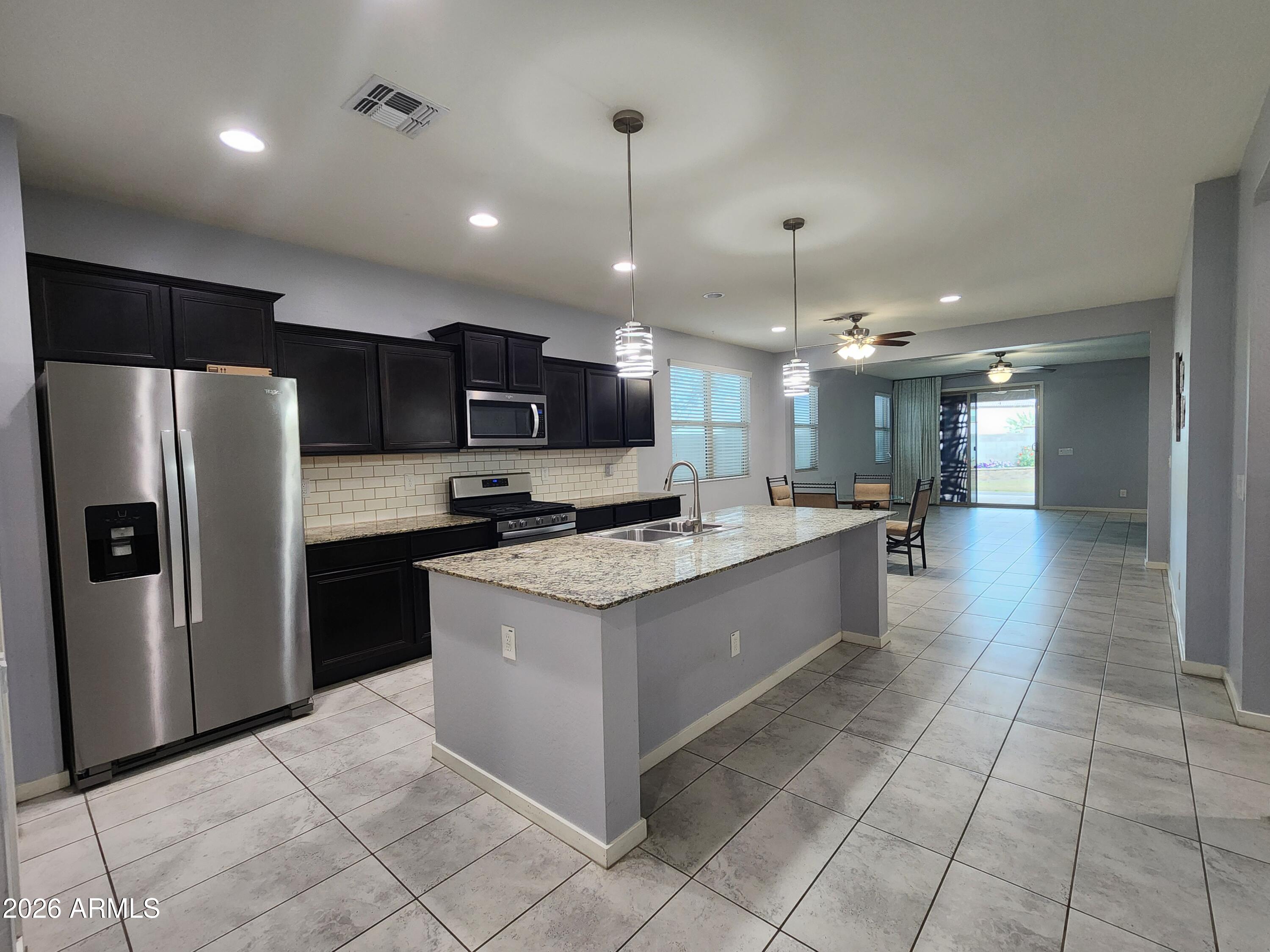 9836 West Atlantis Way Tolleson, AZ 85353 - Photo 8 of 41 20260123_113327