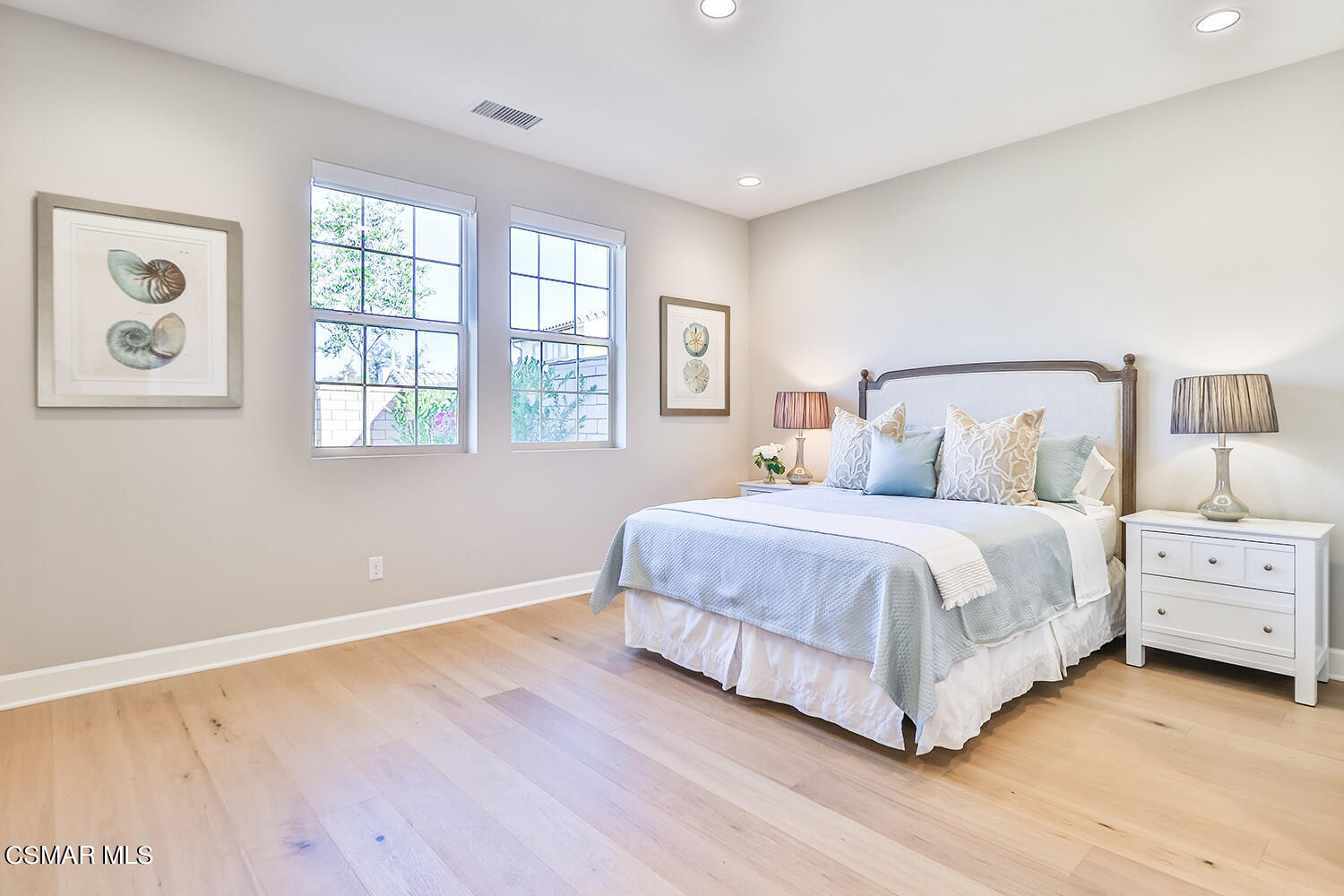 2498 Cherry Tree Drive Camarillo, CA 93012 - Photo 19 of 67 a spacious bedroom with a bed and a window