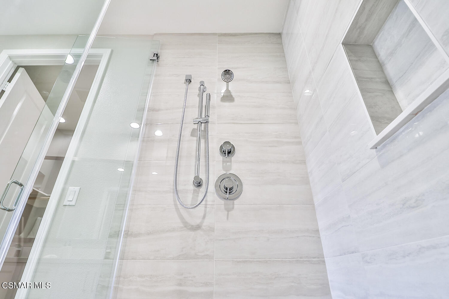 2498 Cherry Tree Drive Camarillo, CA 93012 - Photo 27 of 67 a bathroom with a glass shower door