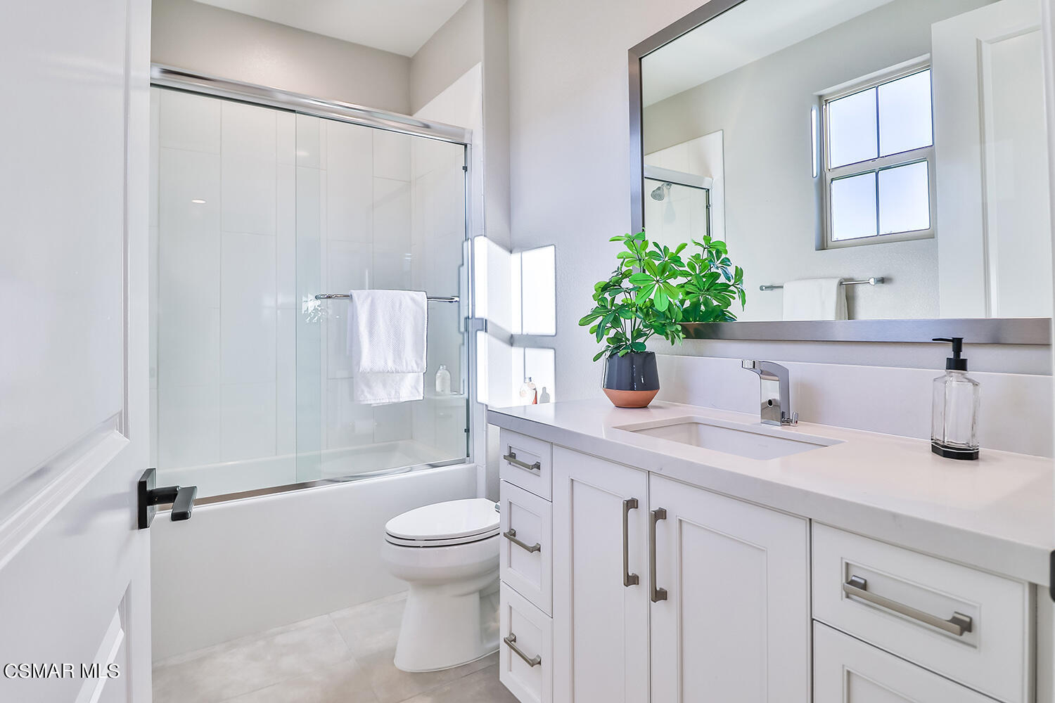 2498 Cherry Tree Drive Camarillo, CA 93012 - Photo 40 of 67 a bathroom with a granite countertop sink a toilet and shower