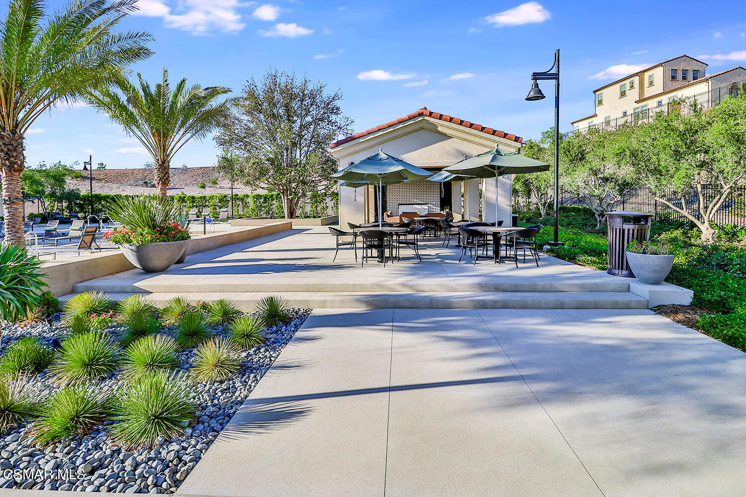 2498 Cherry Tree Drive Camarillo, CA 93012 - Photo 55 of 67 a view of a table and chairs under an umbrella in patio