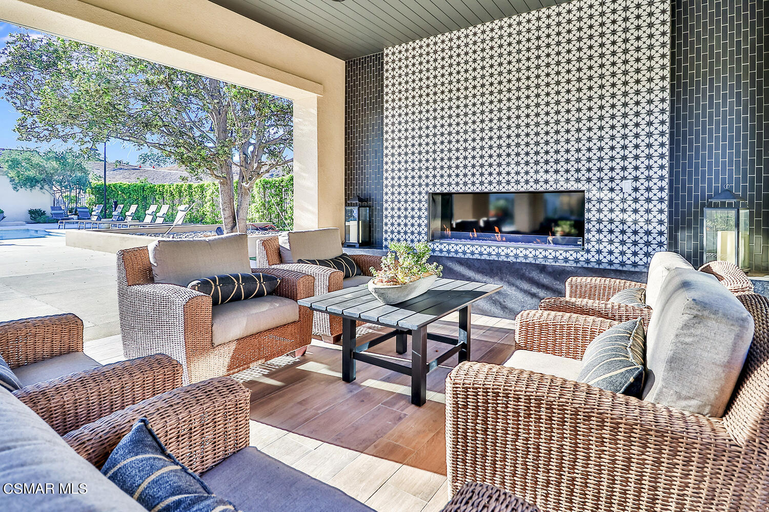 2498 Cherry Tree Drive Camarillo, CA 93012 - Photo 60 of 67 a living room with furniture wooden floor and a fireplace