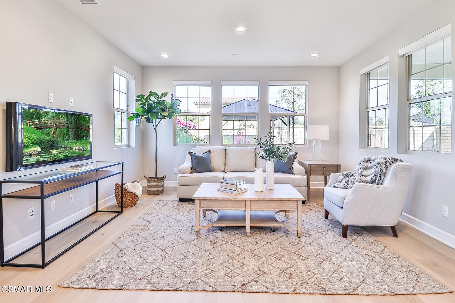 2498 Cherry Tree Drive Camarillo, CA 93012 - Photo 9 of 67 a living room with furniture a flat screen tv and a large window