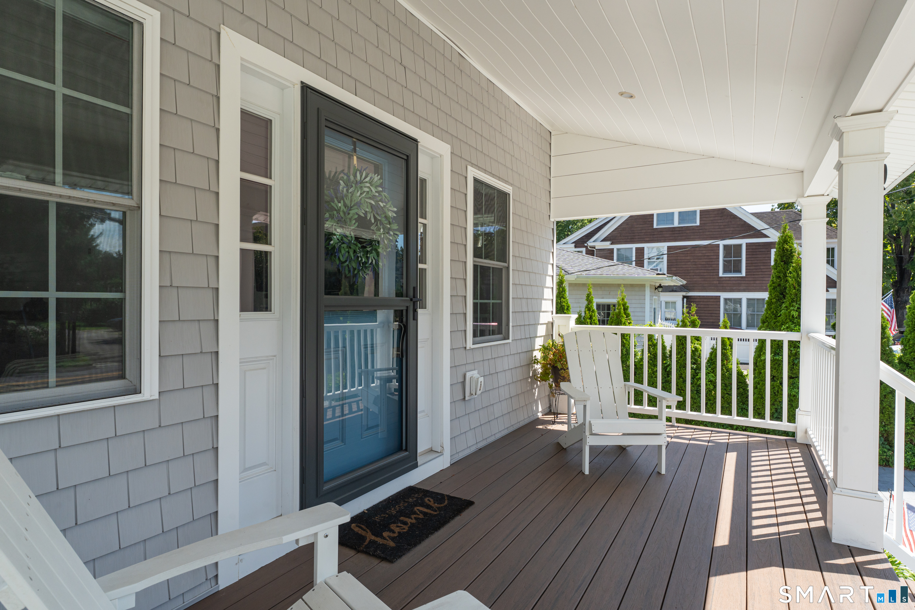 99 East Wharf Road Madison, CT 06443 - Photo 4 of 36 The front provides ample space to meet your guests or watch neighbors walk by.