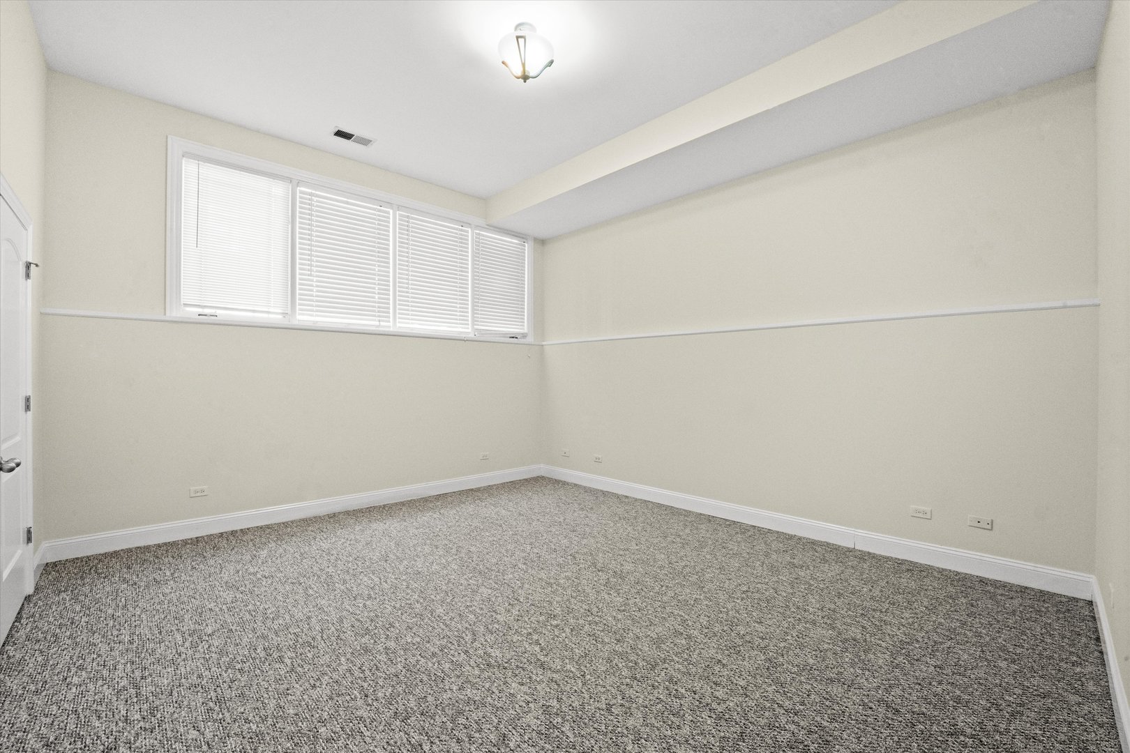 2415 West Palmer Street Chicago, IL 60647 - Photo 21 of 23 an empty room with a natural light