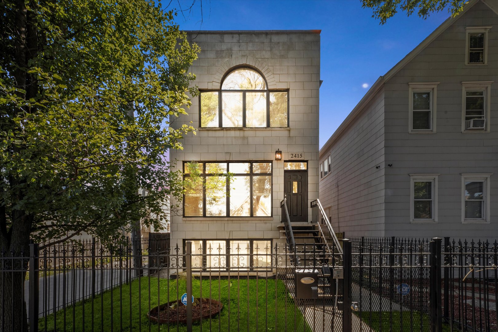 2415 West Palmer Street Chicago, IL 60647 - Photo 23 of 23 a front view of a house