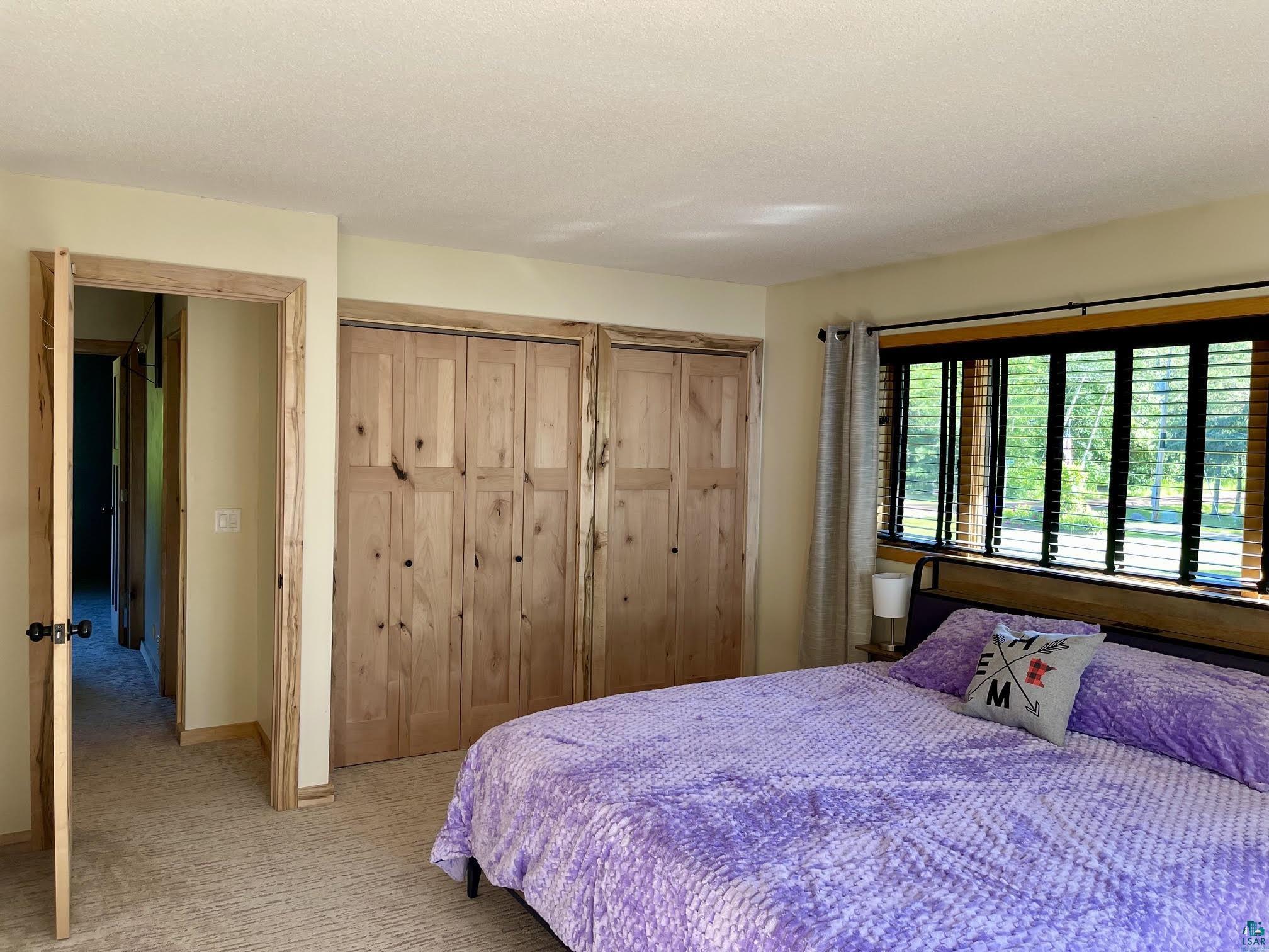 37460 Sunrise View Road Sturgeon Lake, MN 55783 - Photo 26 of 50 Lakeside bedroom view 2.