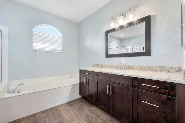 a view of bathroom with dual sinks