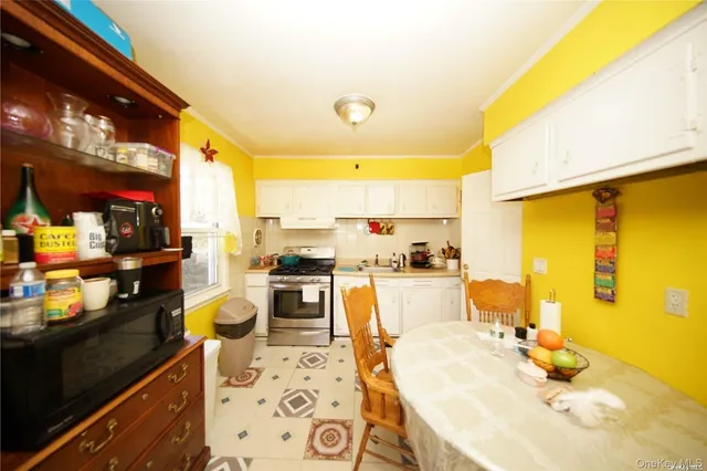 a large kitchen with granite countertop lots of counter top space