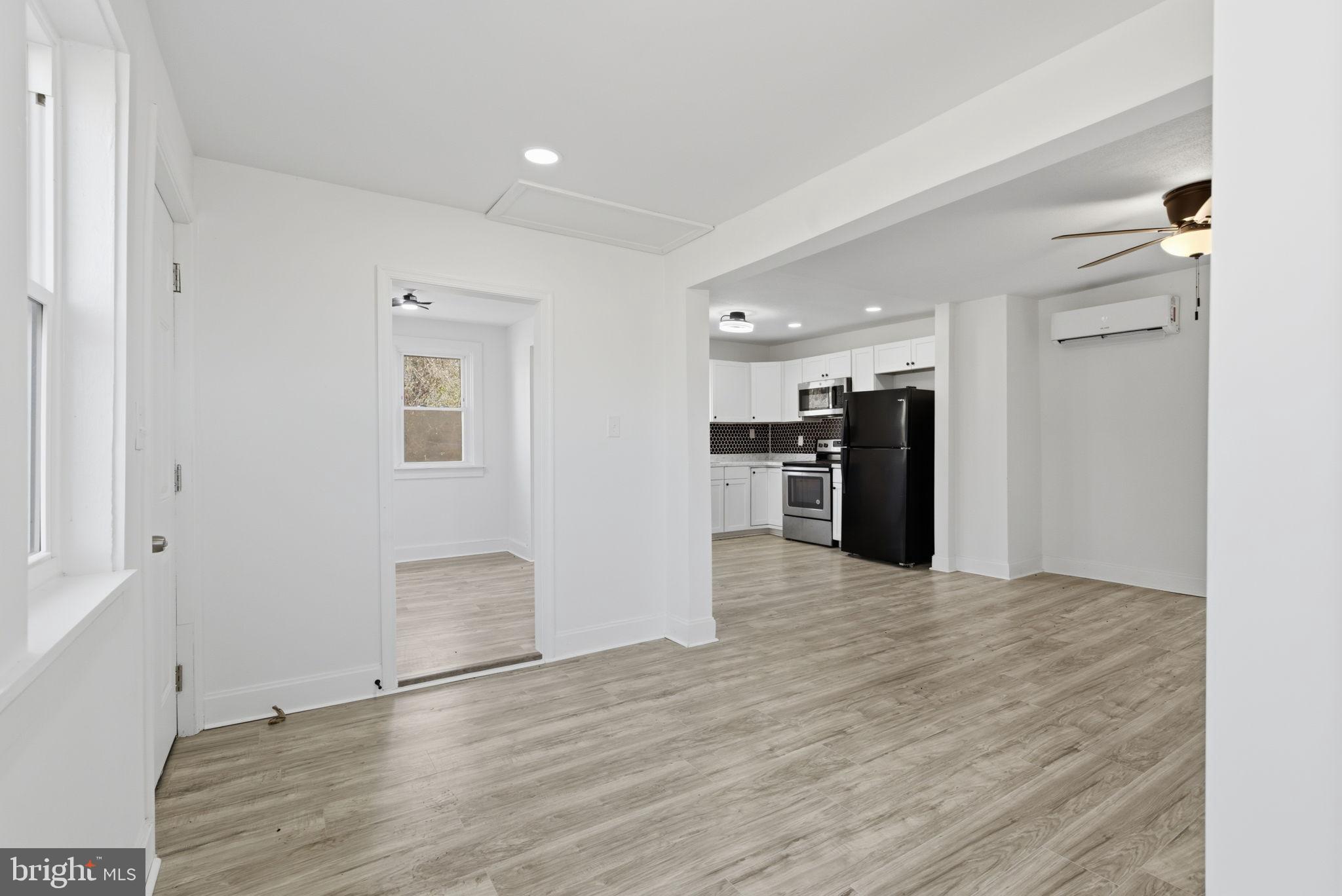 5020 Tucker Hill Road Hague, VA 22469 - Photo 16 of 31 a view of kitchen with refrigerator and windows