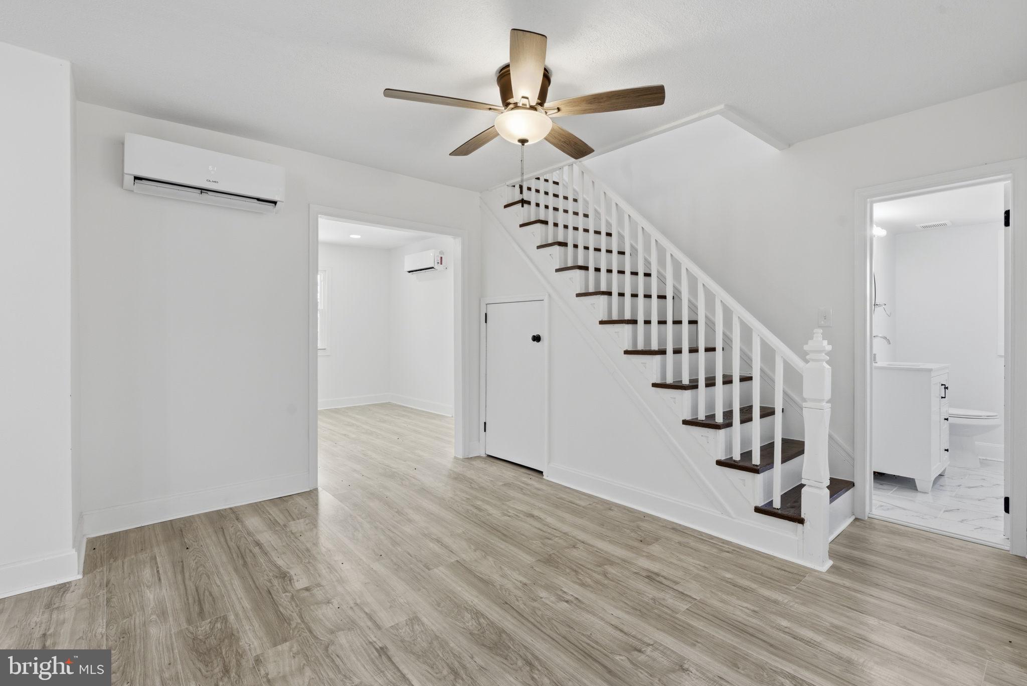 5020 Tucker Hill Road Hague, VA 22469 - Photo 17 of 31 a view of entryway and hall with wooden floor