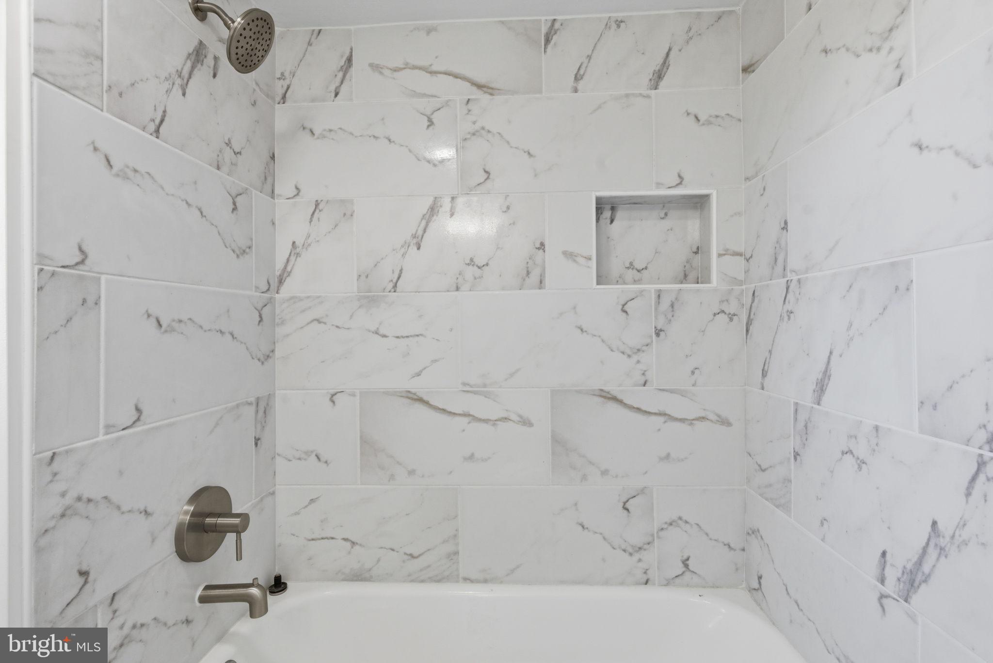 5020 Tucker Hill Road Hague, VA 22469 - Photo 22 of 31 a bathroom with bathtub