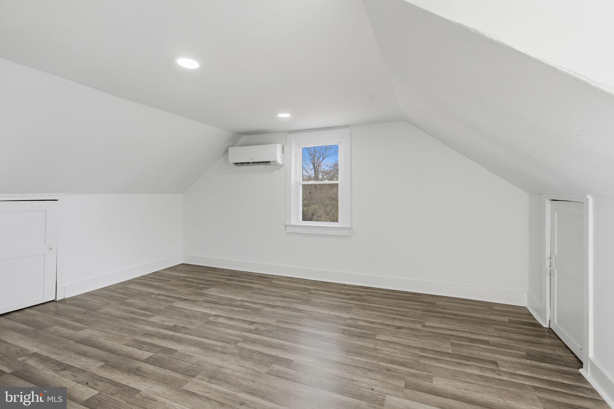 5020 Tucker Hill Road Hague, VA 22469 - Photo 25 of 31 a view of empty room with wooden floor