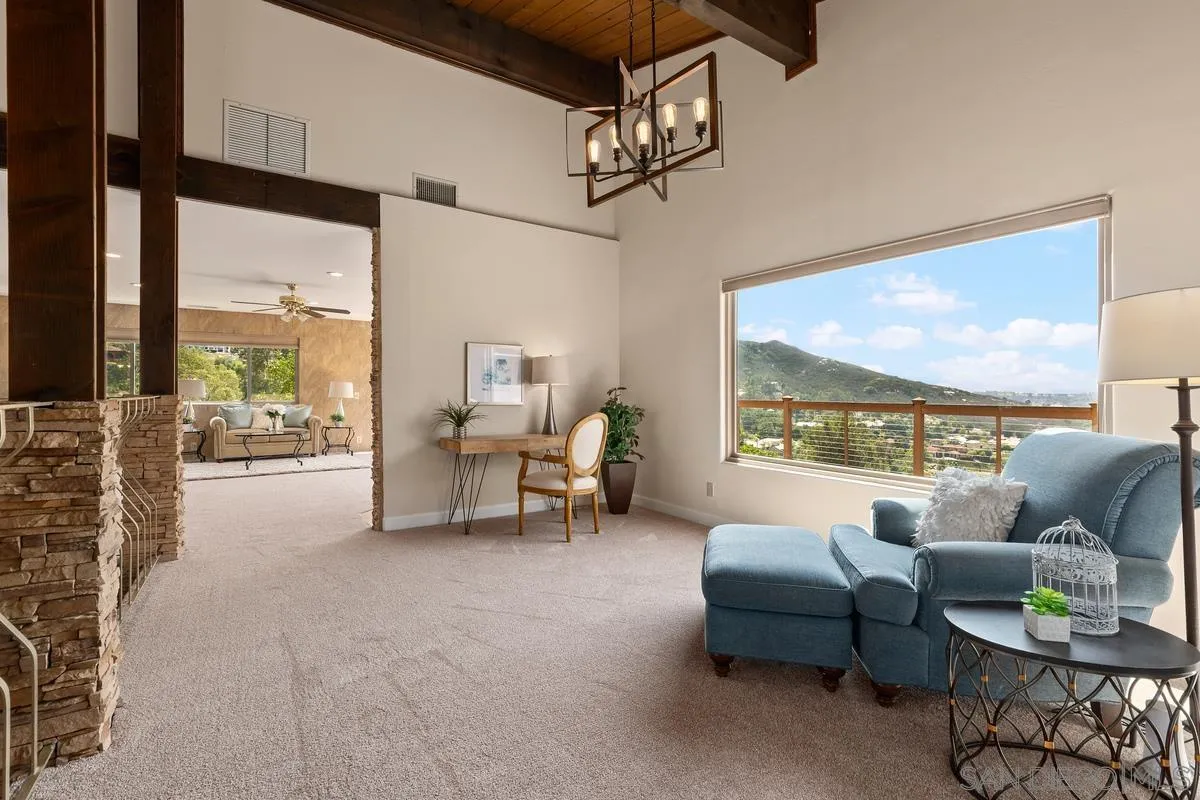 13502 Orchard Gate Road Poway, CA 92064 - Photo 14 of 42 a living room with furniture and a large window