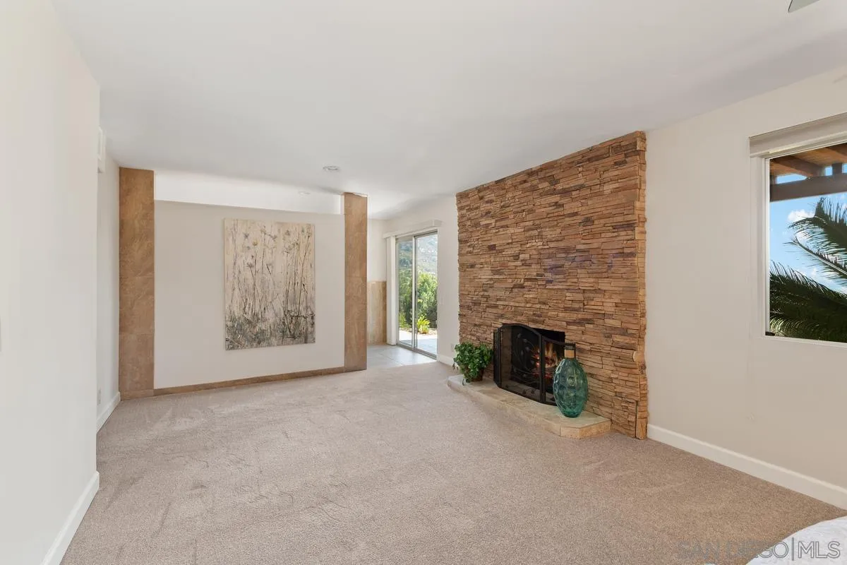 13502 Orchard Gate Road Poway, CA 92064 - Photo 27 of 42 a view of empty room with a fireplace