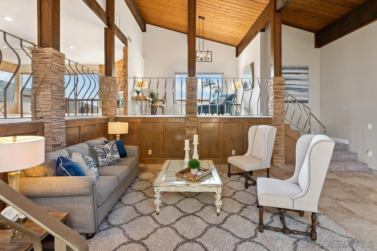 13502 Orchard Gate Road Poway, CA 92064 - Photo 5 of 42 a view of a patio with couches chairs and potted plants