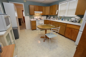 810 Julien Street Belvidere, IL 61008 - Photo 4 of 17 a kitchen with a sink stove and refrigerator