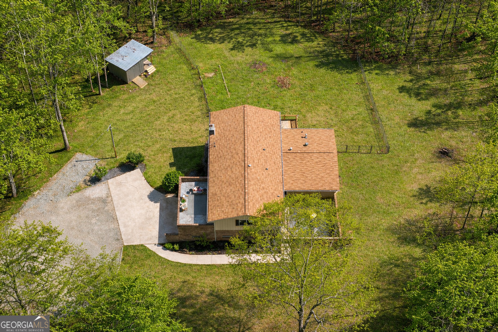 180 Lockwood Road Fayetteville, GA 30215 - Photo 2 of 59 aerial view of a house with a yard